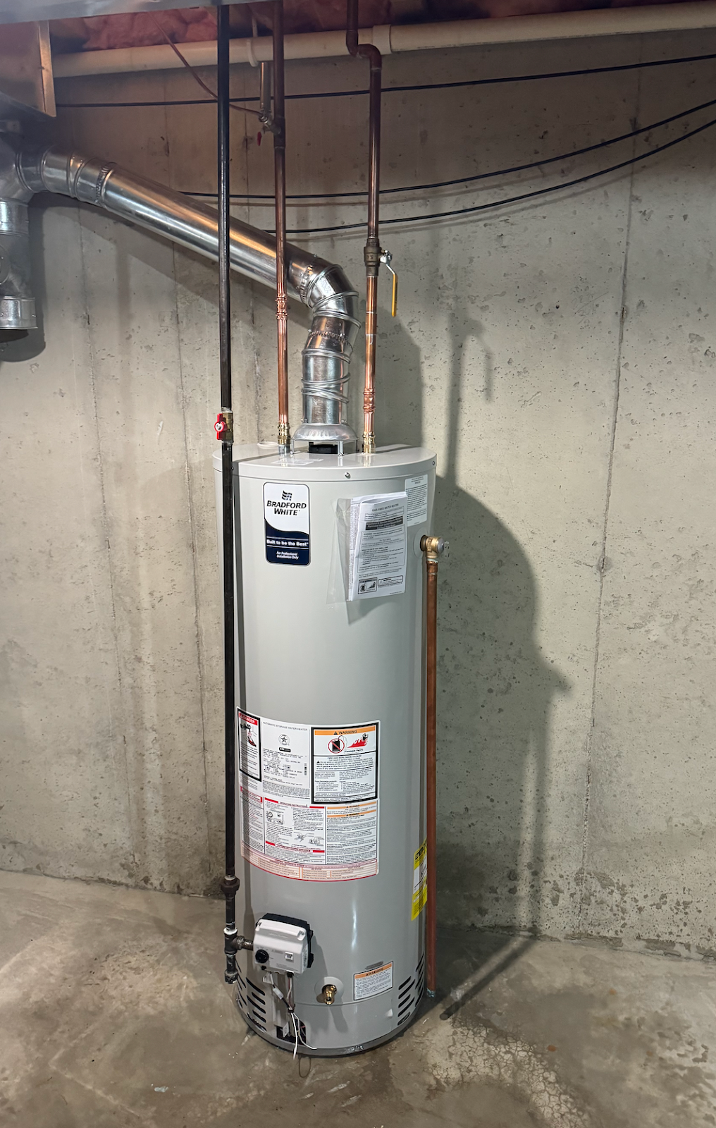 Velocity Master Plumbing technician providing professional water heater services in Ann Arbor Michigan