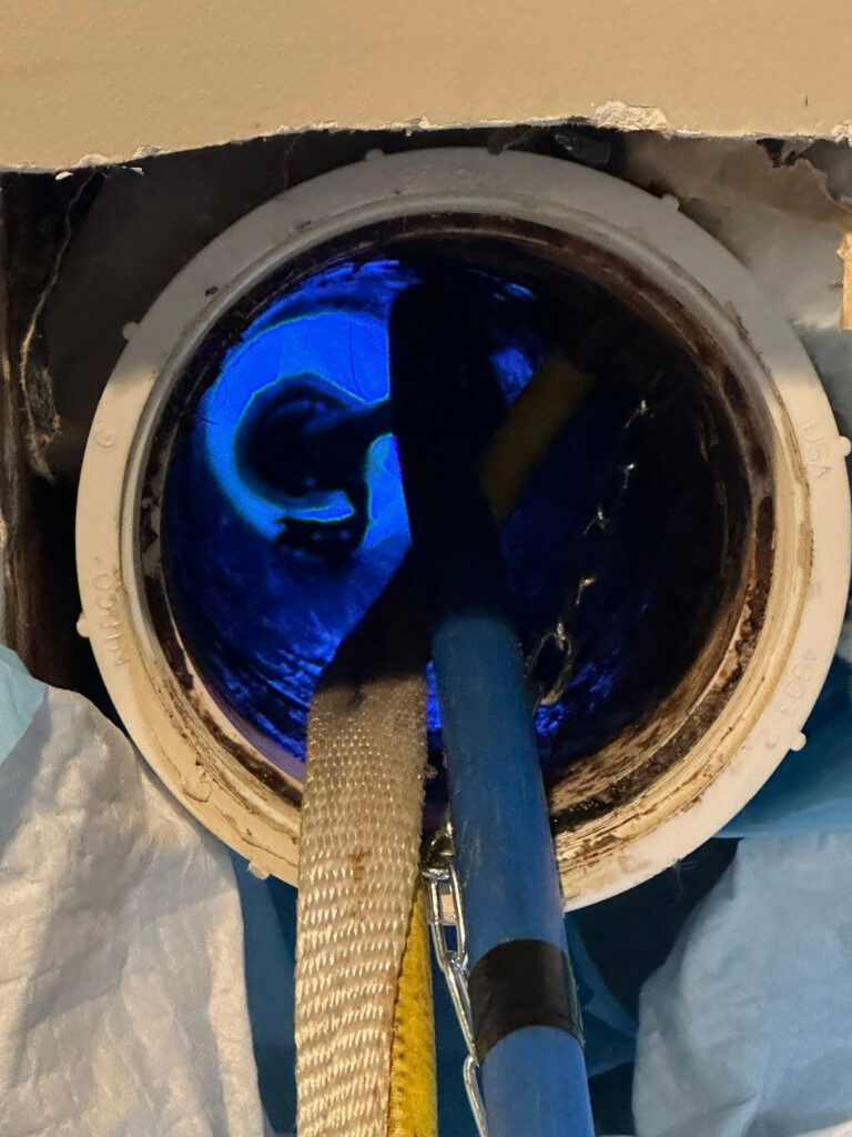 Cured-in-place pipe lining installation inside sewer pipe in Dexter, MI.